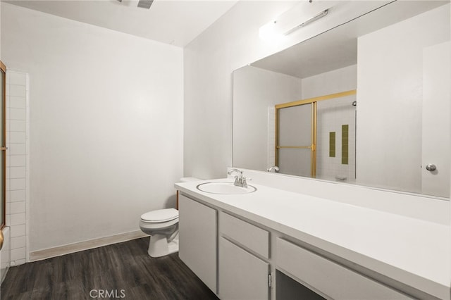 911 N Kings Rd Unit 310, West Hollywood, CA 90069 - bathroom featuring wood finished floors, an enclosed shower, and vanity