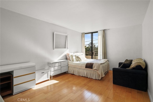 911 N Kings Rd Unit 310, West Hollywood, CA 90069 - bedroom with light wood-style floors