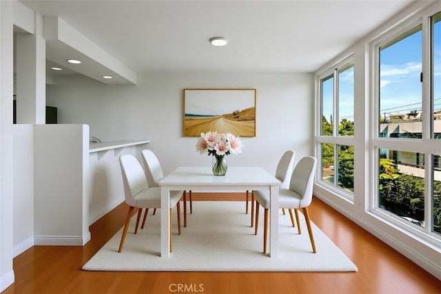 911 N Kings Rd Unit 310, West Hollywood, CA 90069 - dining room with wood finished floors and recessed lighting
