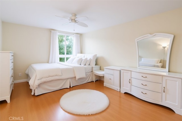 911 N Kings Rd Unit 310, West Hollywood, CA 90069 - bedroom featuring light wood finished floors and a ceiling fan