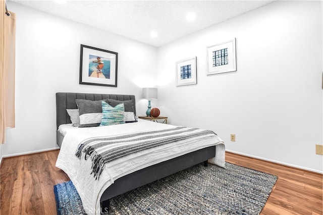 5022 Tamarack Way, Irvine, CA 92612 - bedroom featuring wood finished floors, recessed lighting, and a textured ceiling