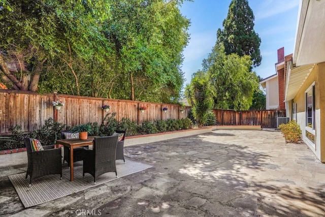 5022 Tamarack Way, Irvine, CA 92612 - fenced backyard featuring a patio area and outdoor dining area