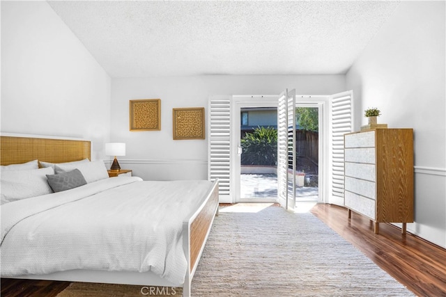 5022 Tamarack Way, Irvine, CA 92612 - bedroom with access to outside, wood finished floors, and a textured ceiling