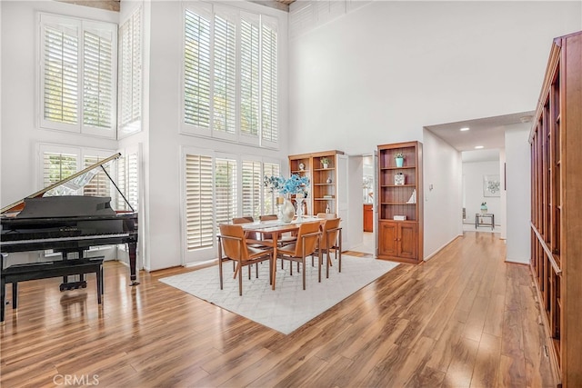 5022 Tamarack Way, Irvine, CA 92612 - dining space with a high ceiling and light wood-type flooring