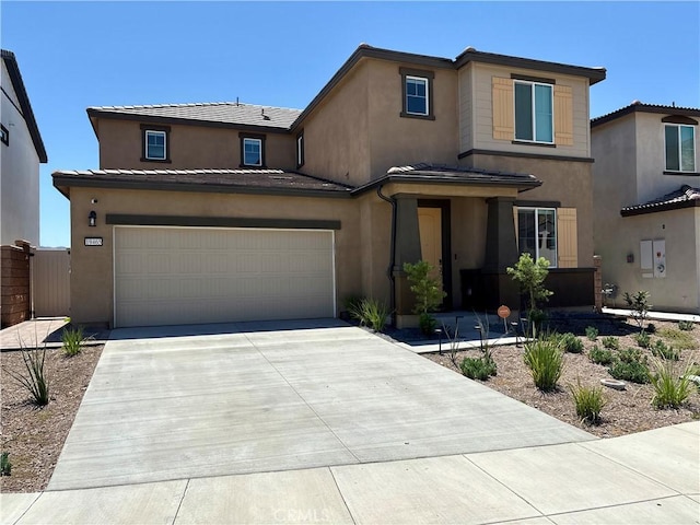 19465 Brush Creek Way, Lake Elsinore, CA 92532 - view of front of property featuring driveway and stucco siding