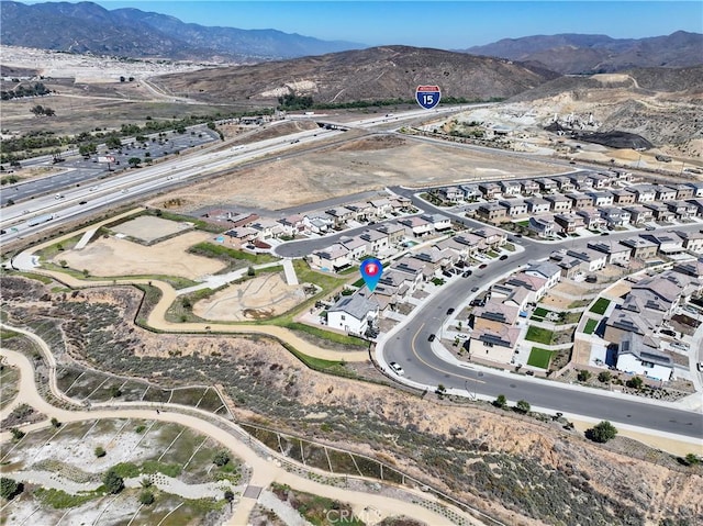 19465 Brush Creek Way, Lake Elsinore, CA 92532 - aerial view of property and surrounding area with a mountainous background and nearby suburban area