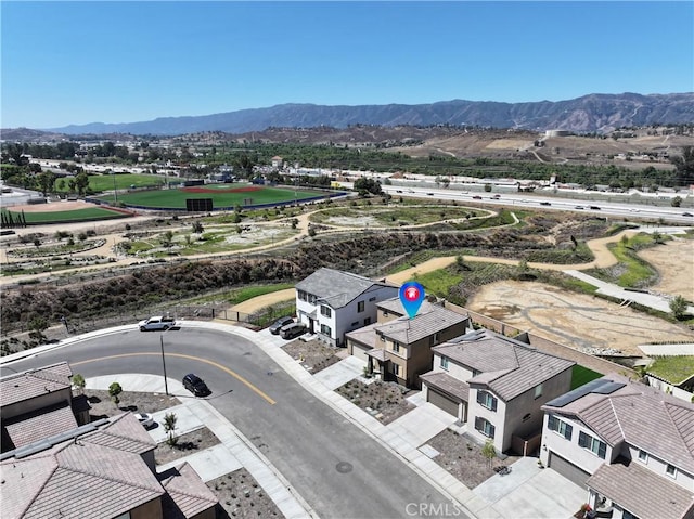 19465 Brush Creek Way, Lake Elsinore, CA 92532 - aerial perspective of suburban area featuring a mountainous background