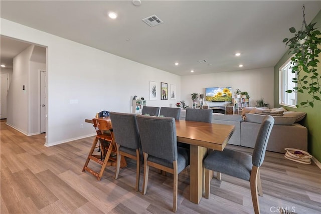 19465 Brush Creek Way, Lake Elsinore, CA 92532 - dining room featuring light wood-type flooring and recessed lighting