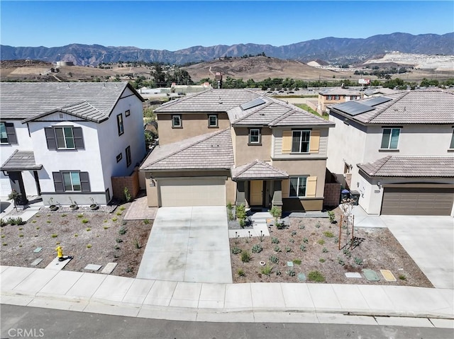 19465 Brush Creek Way, Lake Elsinore, CA 92532 - traditional-style home featuring concrete driveway, stucco siding, and a mountain view
