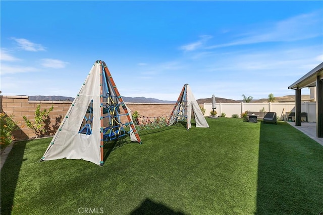 19465 Brush Creek Way, Lake Elsinore, CA 92532 - fenced backyard with a mountain view