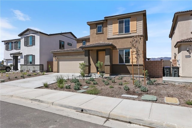 19465 Brush Creek Way, Lake Elsinore, CA 92532 - view of front of house featuring driveway, stucco siding, and a garage