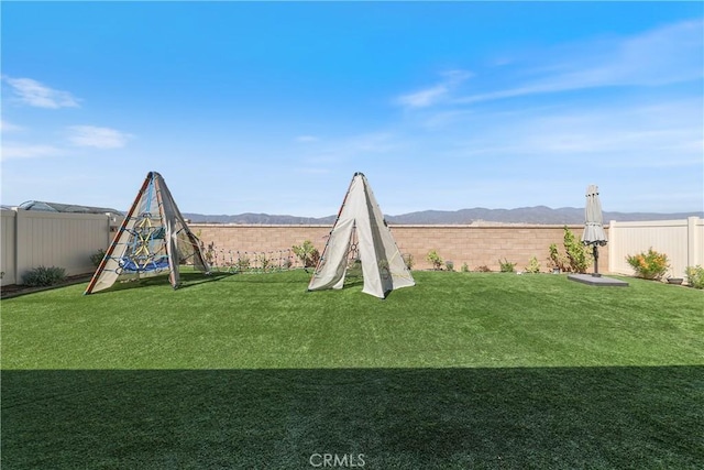 19465 Brush Creek Way, Lake Elsinore, CA 92532 - fenced backyard featuring a mountain view