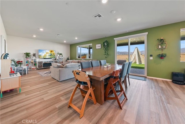 19465 Brush Creek Way, Lake Elsinore, CA 92532 - dining room with light wood finished floors and recessed lighting