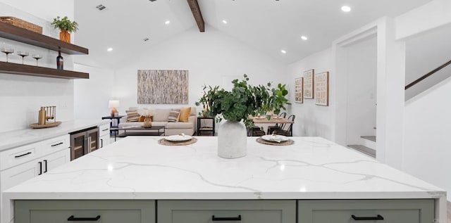 5122 Coban St, San Diego, CA 92114 - kitchen featuring green cabinets, wine cooler, beamed ceiling, light stone counters, and recessed lighting