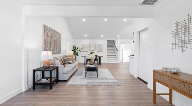 5122 Coban St, San Diego, CA 92114 - living area with stairway, recessed lighting, wood finished floors, and lofted ceiling