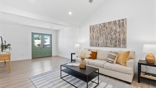 5122 Coban St, San Diego, CA 92114 - living area with wood finished floors, lofted ceiling, and recessed lighting