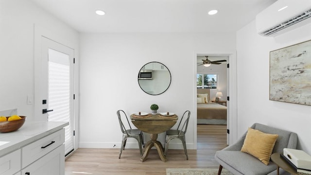 5122 Coban St, San Diego, CA 92114 - dining space featuring a wall unit AC, light wood finished floors, recessed lighting, and ceiling fan