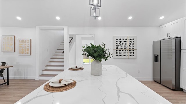 5122 Coban St, San Diego, CA 92114 - dining area featuring stairs, light wood finished floors, and recessed lighting