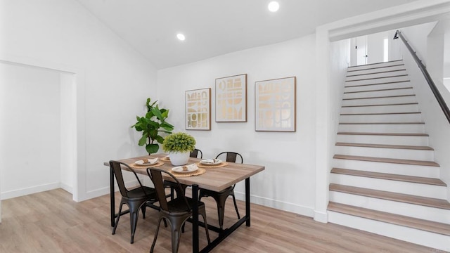 5122 Coban St, San Diego, CA 92114 - dining room with light wood-style floors, stairs, recessed lighting, and vaulted ceiling