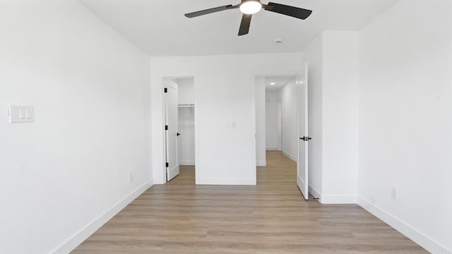 5122 Coban St, San Diego, CA 92114 - unfurnished bedroom with light wood finished floors, a spacious closet, and a ceiling fan