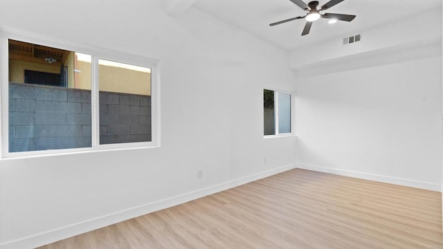 5122 Coban St, San Diego, CA 92114 - spare room featuring wood finished floors, vaulted ceiling, and ceiling fan