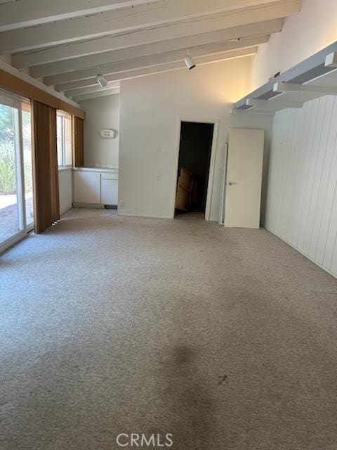 23135 Park Contessa, Calabasas, CA 91302 - unfurnished room featuring light colored carpet and beamed ceiling