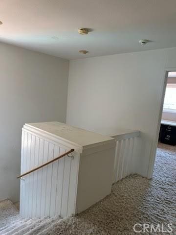 23135 Park Contessa, Calabasas, CA 91302 - hall with carpet floors and an upstairs landing