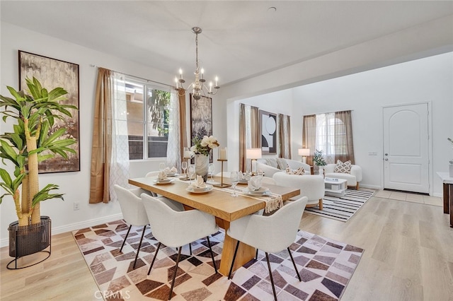 9370 Bistro Pl, Rancho Cucamonga, CA 91730 - dining space featuring a chandelier and light wood-style flooring