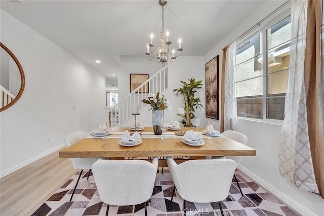9370 Bistro Pl, Rancho Cucamonga, CA 91730 - dining area with stairway, a chandelier, healthy amount of natural light, recessed lighting, and wood finished floors