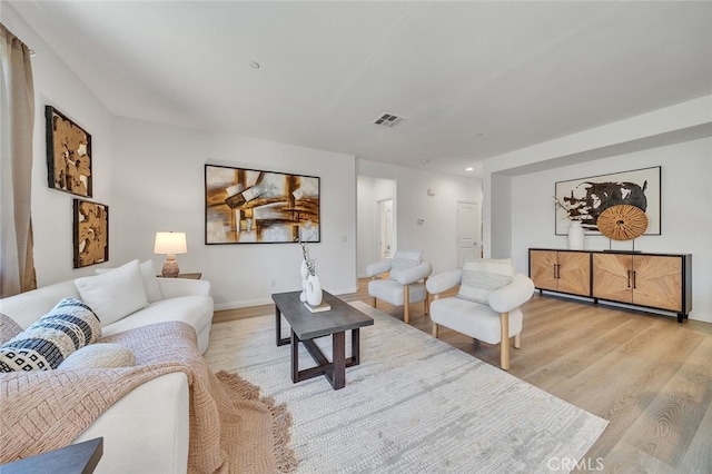 9370 Bistro Pl, Rancho Cucamonga, CA 91730 - living area featuring wood finished floors and recessed lighting
