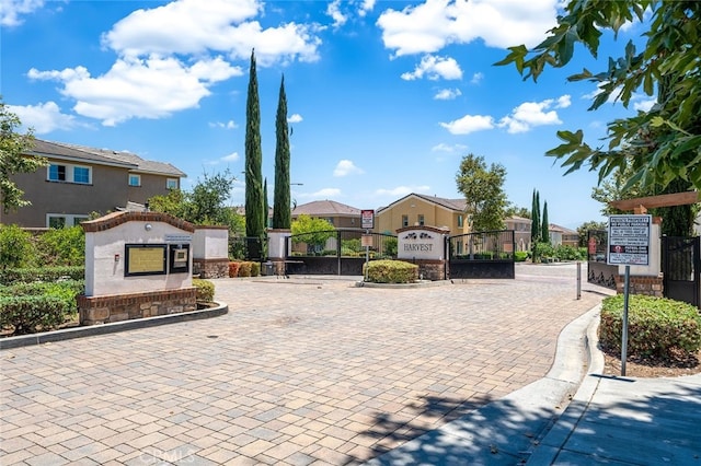 9370 Bistro Pl, Rancho Cucamonga, CA 91730 - view of home's community featuring a residential view and a gate