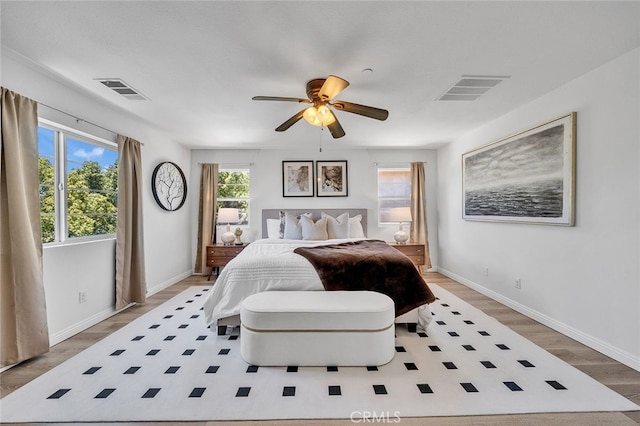 9370 Bistro Pl, Rancho Cucamonga, CA 91730 - bedroom with wood finished floors and baseboards