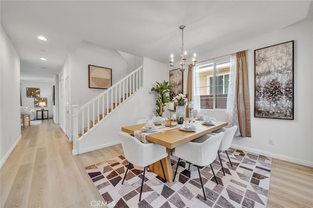 9370 Bistro Pl, Rancho Cucamonga, CA 91730 - dining space with stairs, light wood-style floors, recessed lighting, and a chandelier