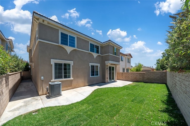 9370 Bistro Pl, Rancho Cucamonga, CA 91730 - rear view of property featuring stucco siding, a patio area, and a fenced backyard