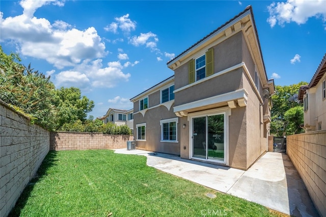 9370 Bistro Pl, Rancho Cucamonga, CA 91730 - rear view of house with stucco siding, a fenced backyard, and a patio