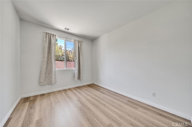 9370 Bistro Pl, Rancho Cucamonga, CA 91730 - unfurnished room featuring wood finished floors and baseboards