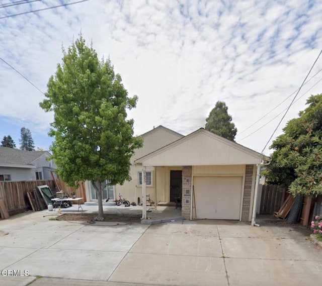 31953 Potsdam St, Hayward, CA 94544 - ranch-style house with a garage and concrete driveway