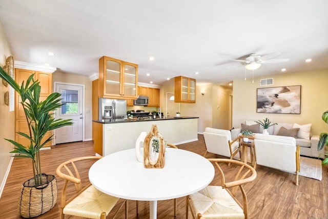 4110 Lewis St, Oceanside, CA 92056 - dining room with wood finished floors, recessed lighting, and a ceiling fan