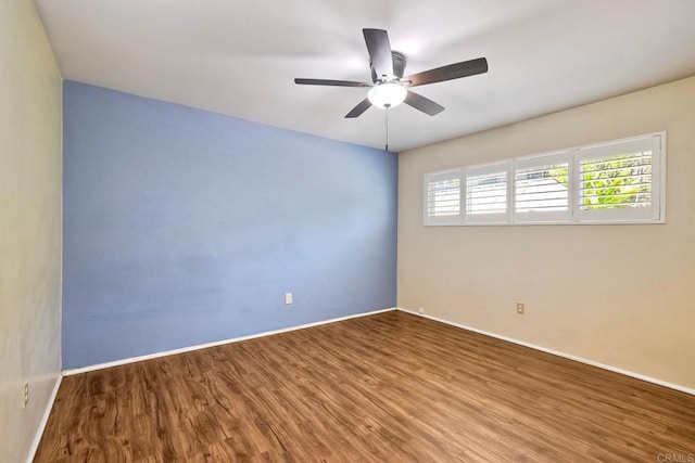 4110 Lewis St, Oceanside, CA 92056 - empty room with wood finished floors and a ceiling fan