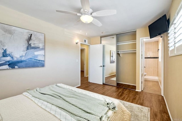 4110 Lewis St, Oceanside, CA 92056 - bedroom with wood finished floors, a closet, ensuite bath, and ceiling fan