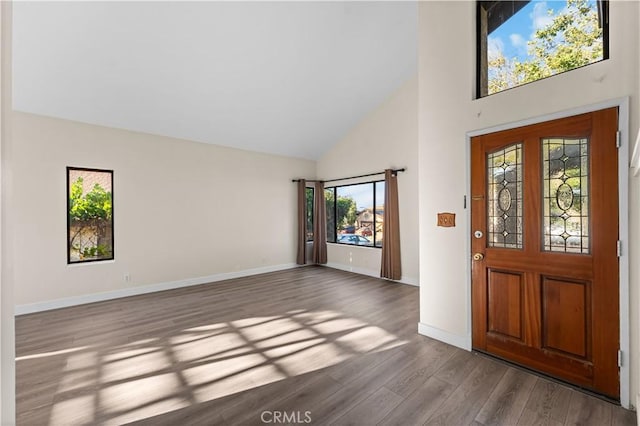 36647 Apache Plume Dr, Palmdale, CA 93550 - foyer entrance with high vaulted ceiling and dark wood-style floors