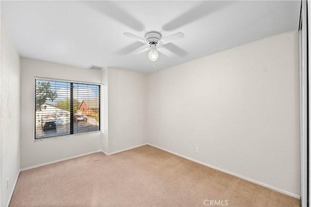 36647 Apache Plume Dr, Palmdale, CA 93550 - empty room featuring light colored carpet and a ceiling fan