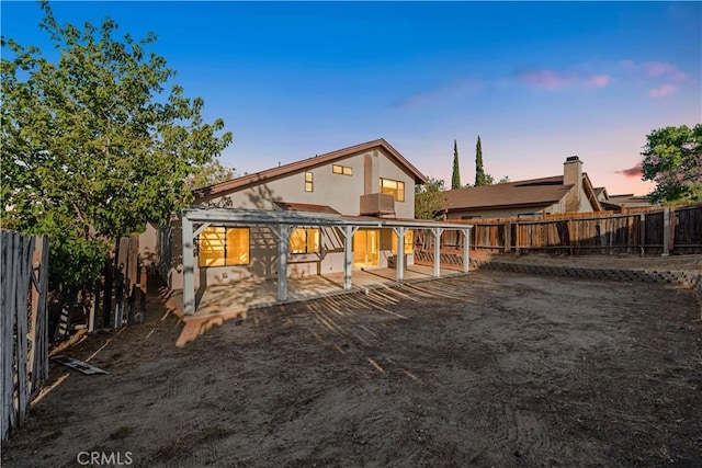 36647 Apache Plume Dr, Palmdale, CA 93550 - rear view of house featuring a patio, a fenced backyard, and stucco siding