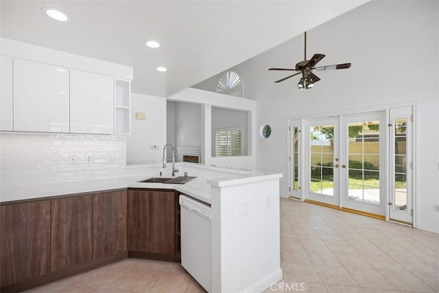 15 Havre Ct, Lake Forest, CA 92610 - kitchen with white dishwasher, a peninsula, white cabinetry, open shelves, and light tile patterned flooring
