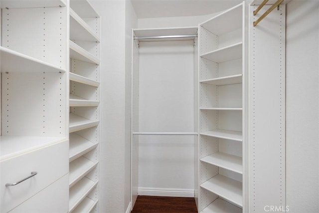 15 Havre Ct, Lake Forest, CA 92610 - spacious closet featuring wood finished floors