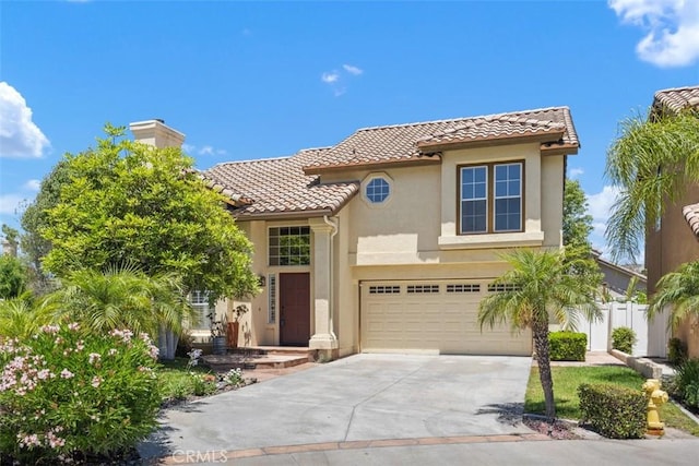 15 Havre Ct, Lake Forest, CA 92610 - mediterranean / spanish house featuring a tile roof, stucco siding, concrete driveway, an attached garage, and a chimney