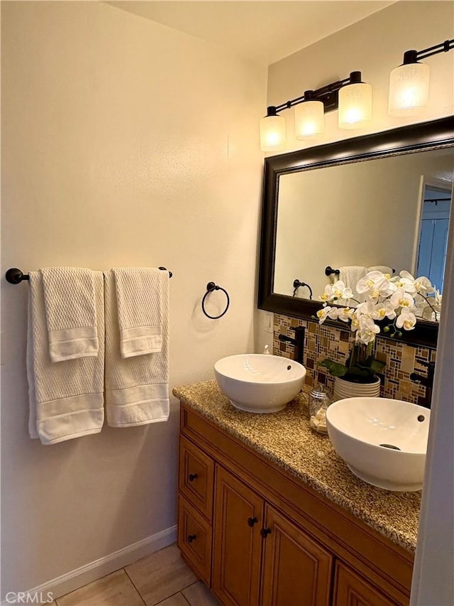 2030 Jefferson Dr, Pasadena, CA 91104 - full bathroom featuring double vanity, tile patterned flooring, and backsplash