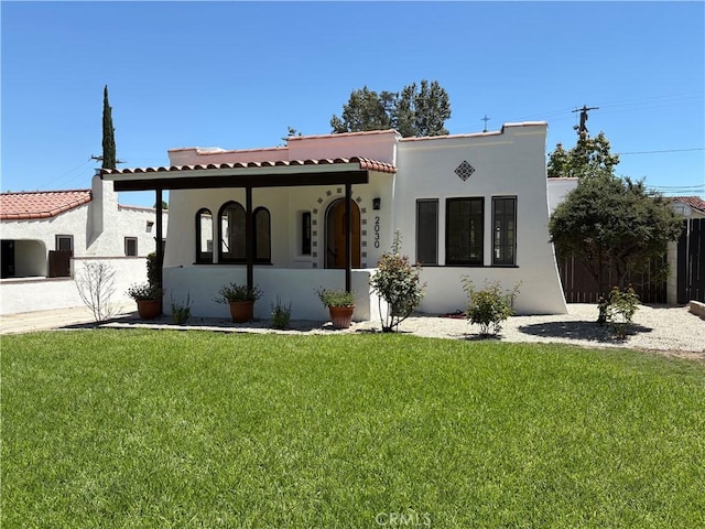 2030 Jefferson Dr, Pasadena, CA 91104 - mediterranean / spanish-style house featuring stucco siding and a tiled roof