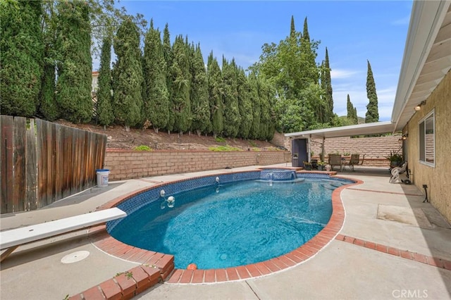 13329 Mission Tierra Way, Granada Hills, CA 91344 - view of swimming pool with a patio, a diving board, and a fenced backyard