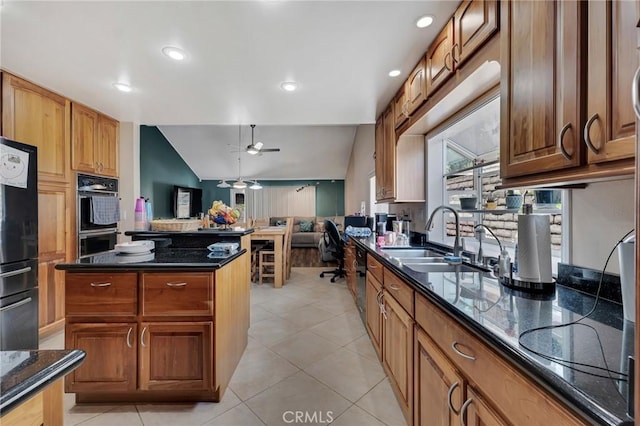 13329 Mission Tierra Way, Granada Hills, CA 91344 - kitchen featuring black appliances, a ceiling fan, open floor plan, dark stone countertops, and lofted ceiling
